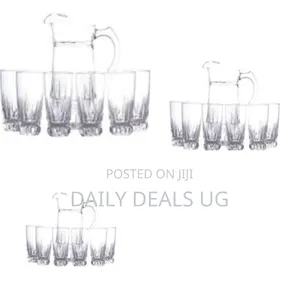 Elegant Glass Pitcher and Tumbler Set With Textured Diamond Design
