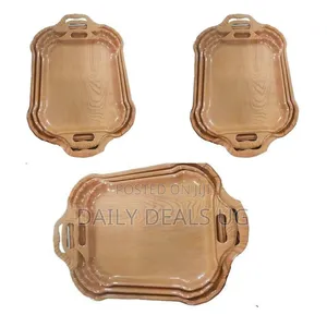 A Set of Three Melamine Serving Trays