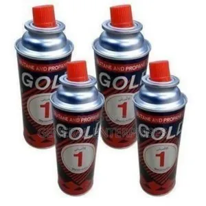 A Set of Gold One Butane and Propane Gas Canisters.