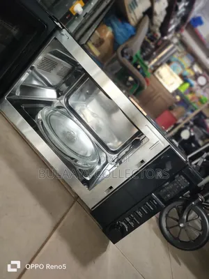Uk Used De'longhi Combination Microwave Oven With Grill.