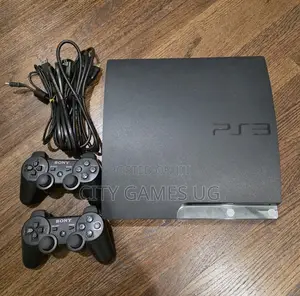 Sony Playstation 3 Slim Console- 2 Controllers and Lot of Games