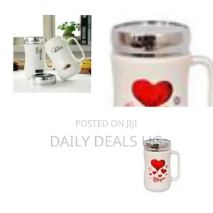 White Ceramic Travel Mug Featuring a Red Heart