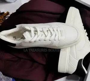 White Low Top Black Heel Sneakers.