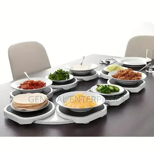 Table Lazy Susan by Sharper Image Is a Modular, Expandable Turntable