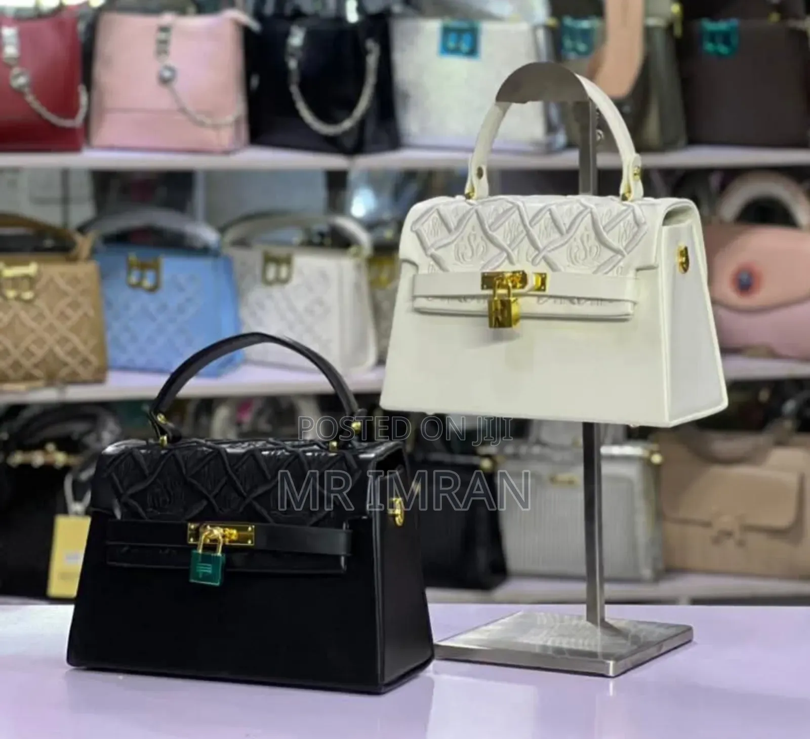Kelly Bag, Featuring a Structured Shape and a Signature Twist Lock.