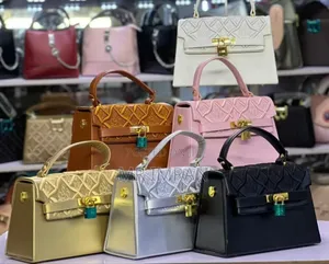 Kelly Bag, Featuring a Structured Shape and a Signature Twist Lock.