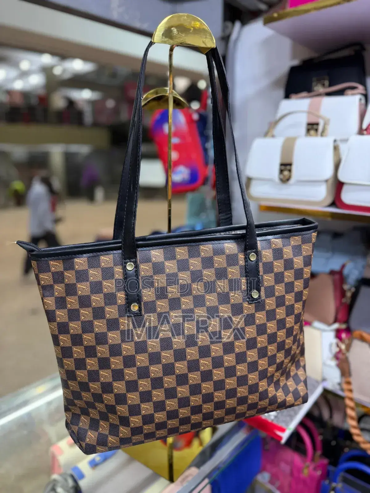 Leather Tote Bag With Durable Shoulder Straps.
