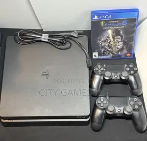 Sony Playstation 4 Slim 500gb With 2 Controllers Games