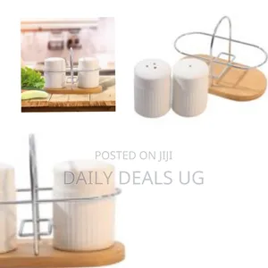 White Porcelain Salt Shaker Set With a Bamboo Base and Metal Stand