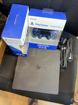 Sony Playstation 4 Slimconsolewith 2controllers, Accessories and Games