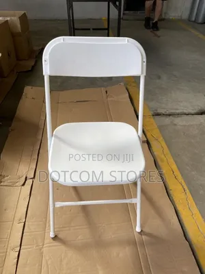 White Plastic and Steel Folding Chair