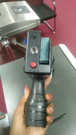 Hand Held Printer - Labelling Machine. Batch No. Expiry Date MFG