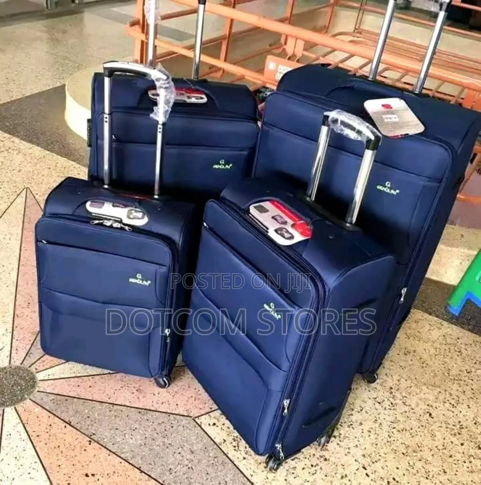 Set of Four Blue Suitcases