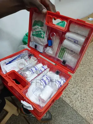 Portable Red Plastic First Aid Kit.