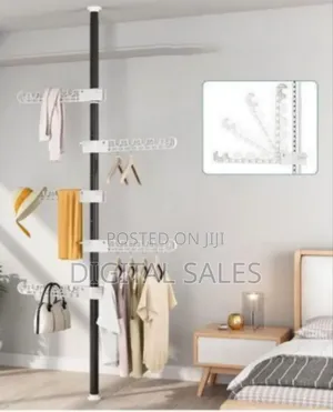 Wall-Mounted Foldable Clothes Rack With Adjustable Height