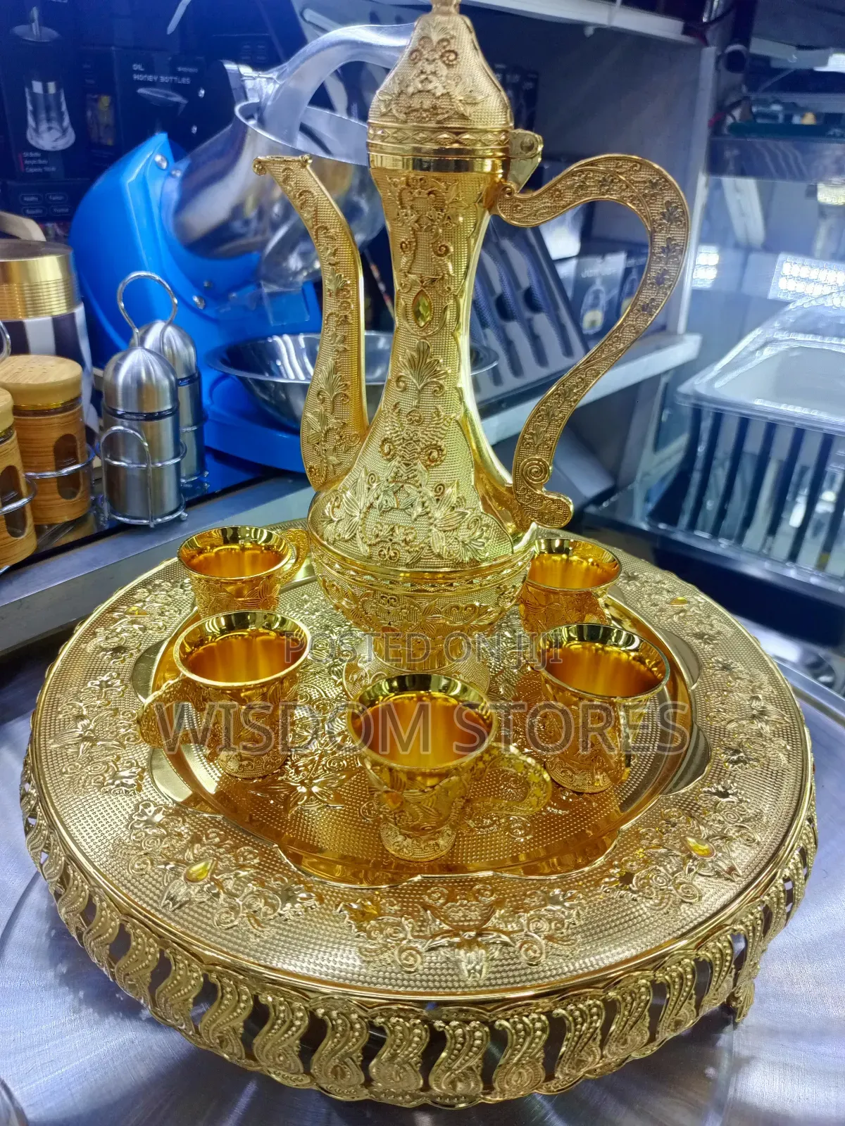Intricate Gold-Colored Traditional Tea