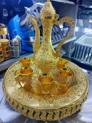 Intricate Gold-Colored Traditional Tea