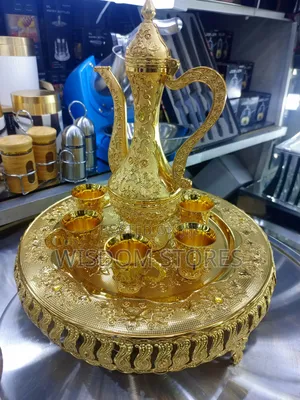 Intricate Gold-Colored Traditional Tea