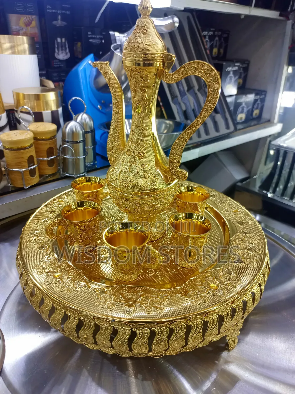 Intricate Gold-Colored Traditional Tea