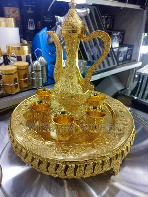 Intricate Gold-Colored Traditional Tea