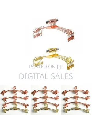 Set of 5 Rose Gold Metal Hangers With Clips