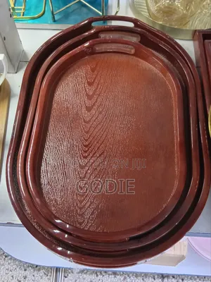 Three Nested, Oval-Shaped Bamboo Serving Trays