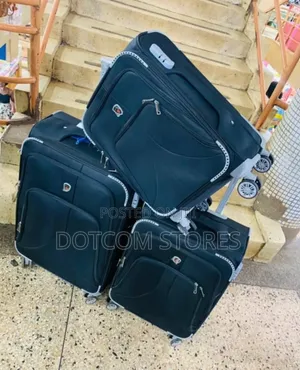Set of Black Fabric Traveling Suitcases