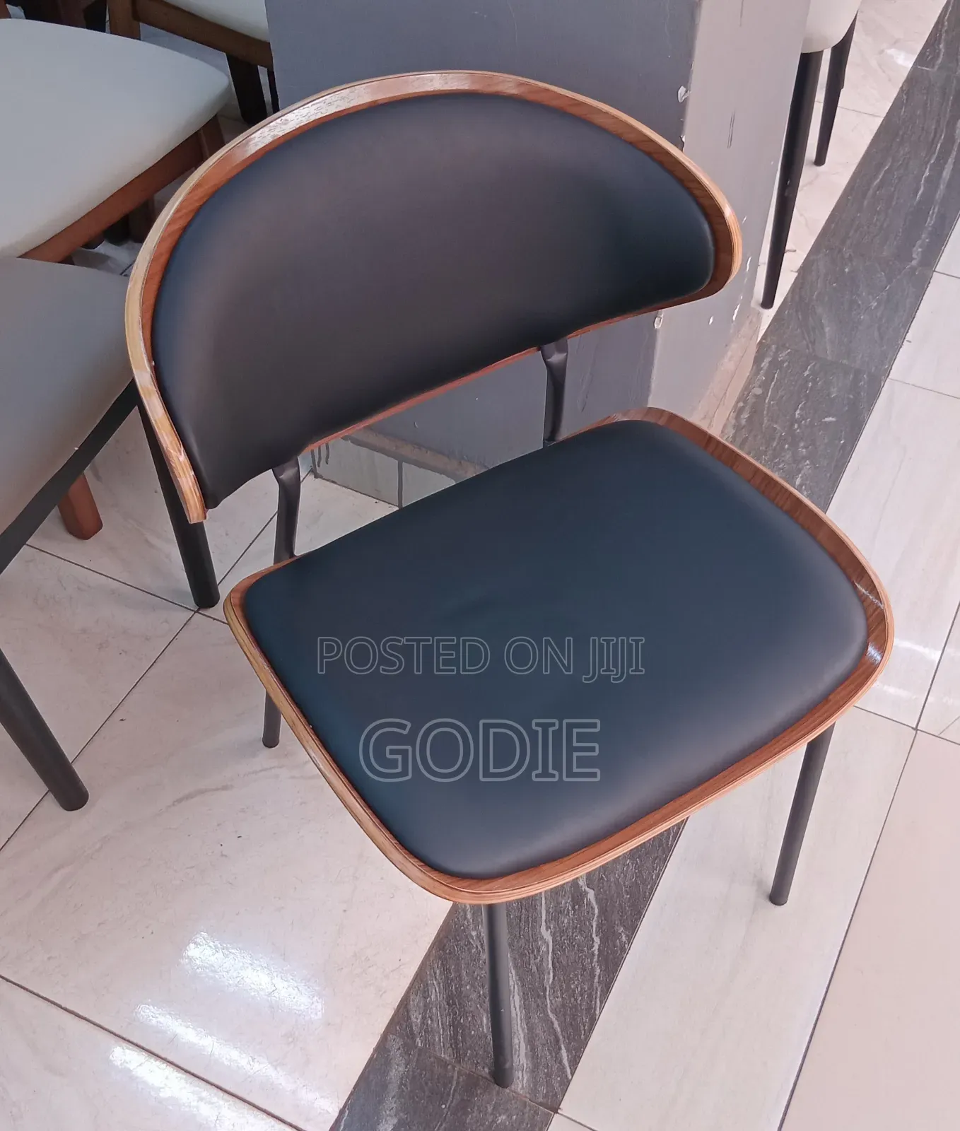 Modern Dining Chair Featuring a Black Pu Leather