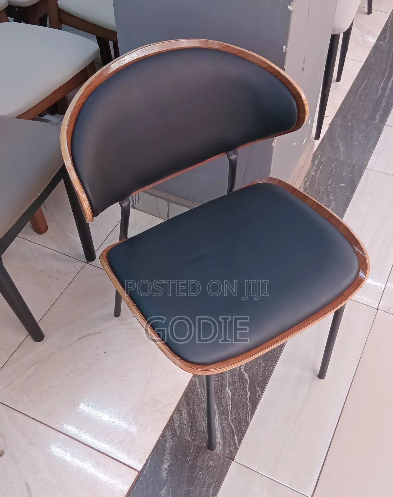 Modern Dining Chair Featuring a Black Pu Leather