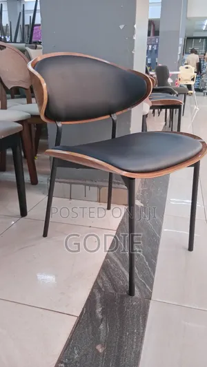 Modern Dining Chair Featuring a Black Pu Leather