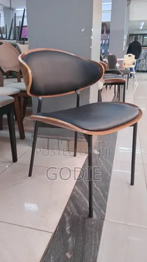 Modern Dining Chair Featuring a Black Pu Leather
