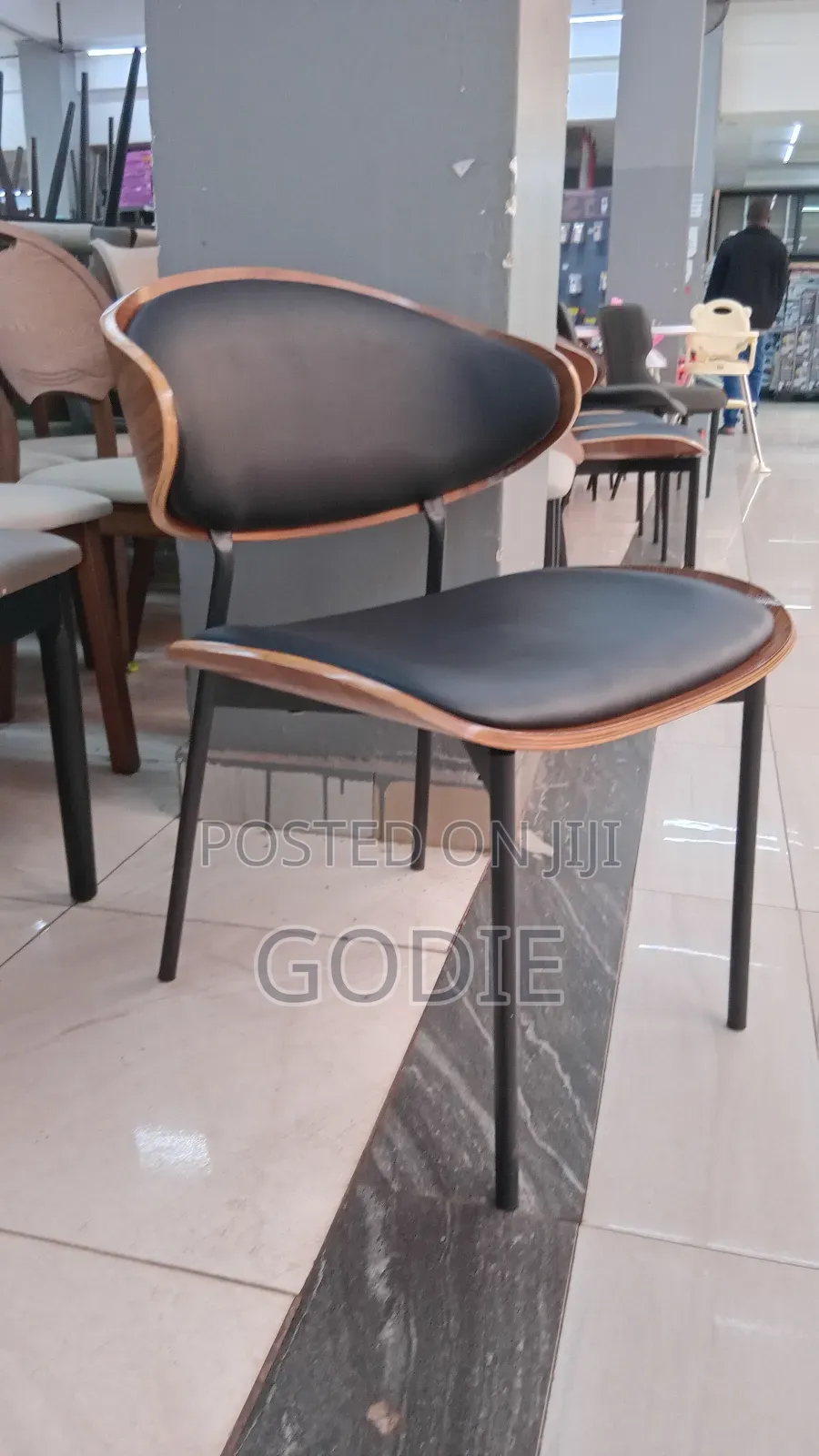 Modern Dining Chair Featuring a Black Pu Leather