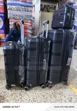 Original Rubber Plastic Suitcases. 4pcs. Black Color