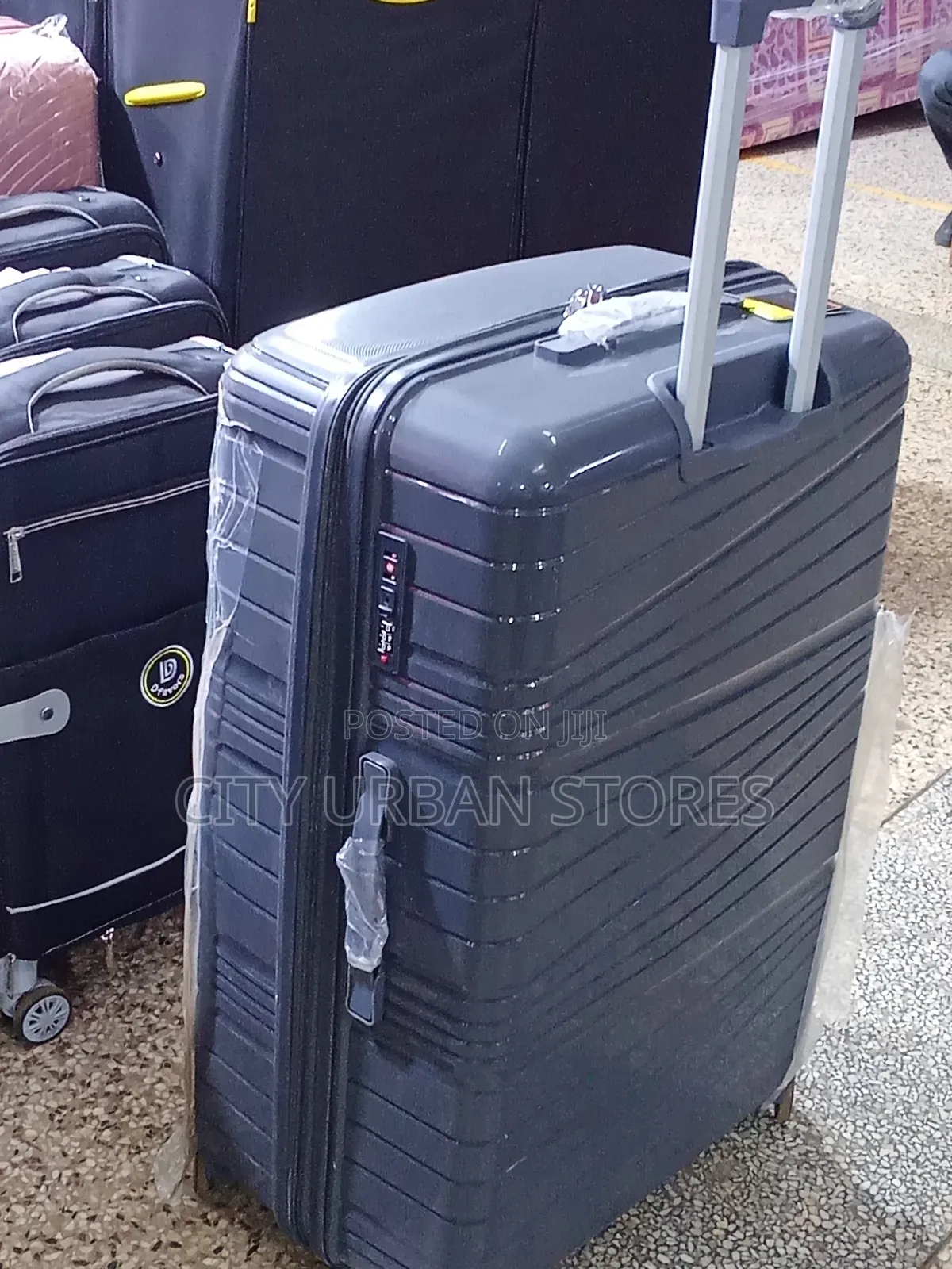 Grey Color Medium 4 Wheels Suitcase
