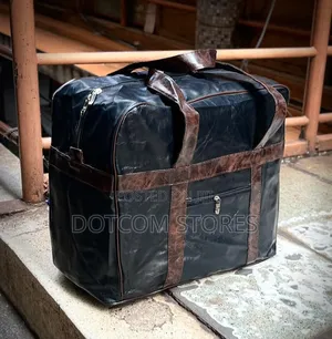 Conqueror Travel Bag in Black and Brown.