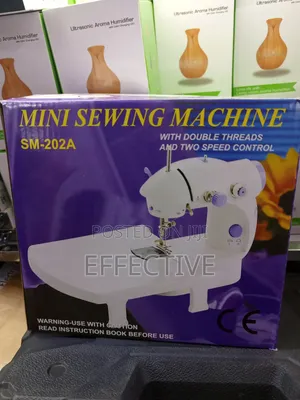 Sm-202a Mini Sewing Machine.