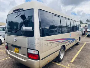 Toyota Coaster 2013 Gold