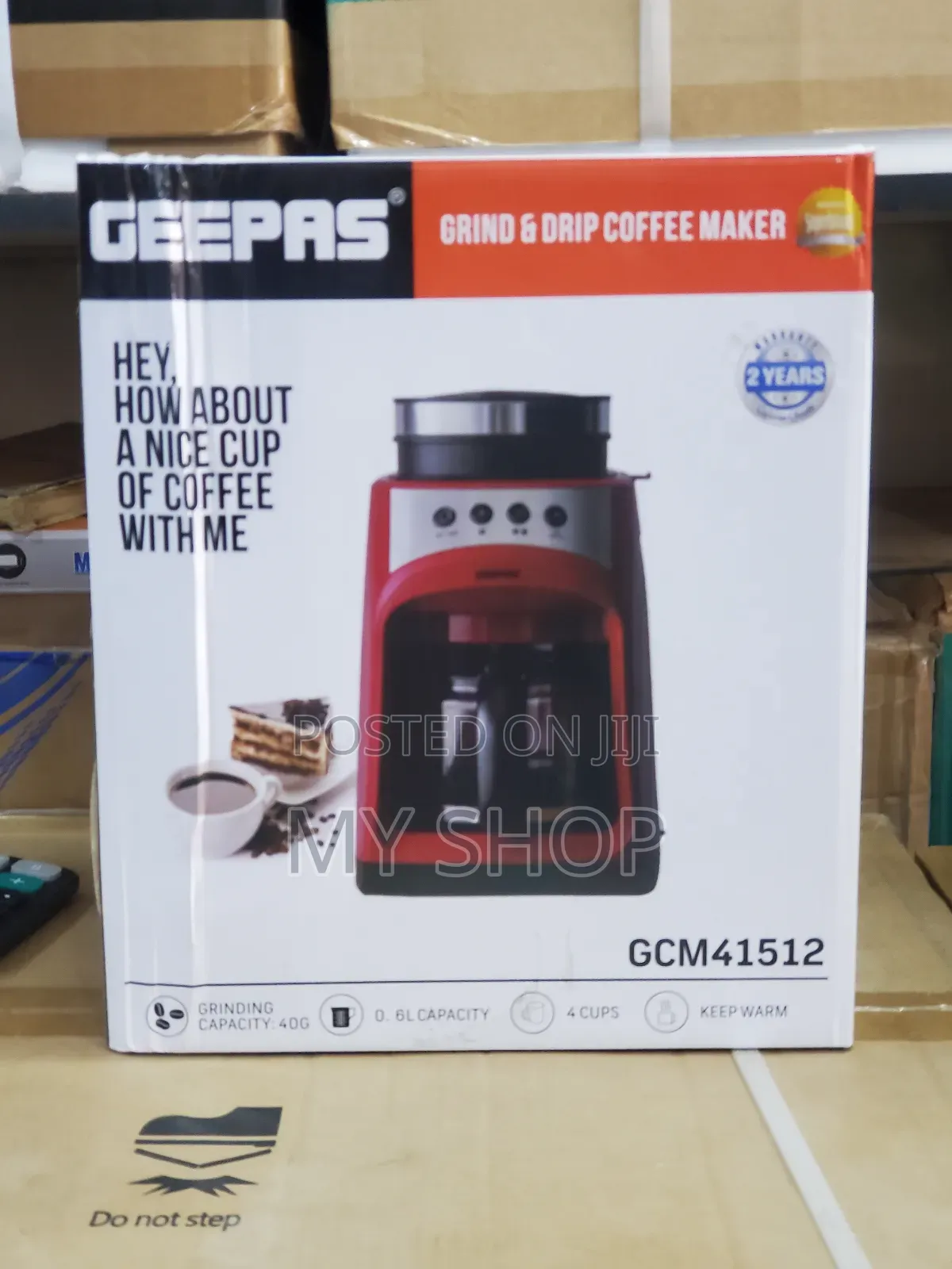 A Coffee Maker With a Coffee Grinder on It