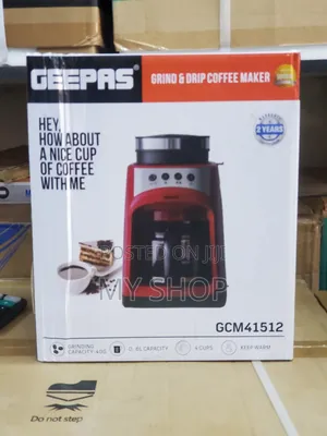 A Coffee Maker With a Coffee Grinder on It