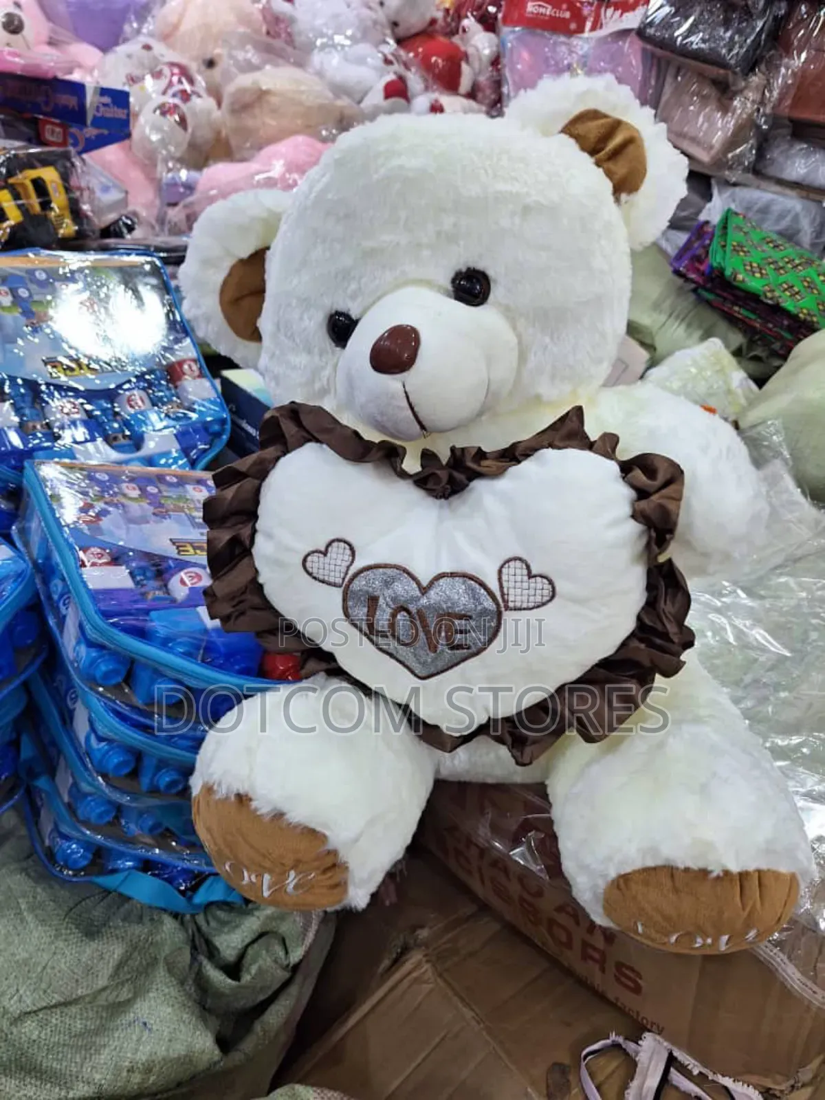 Large White Plush Teddy Bear Holding a Heart Pillow With "Love"