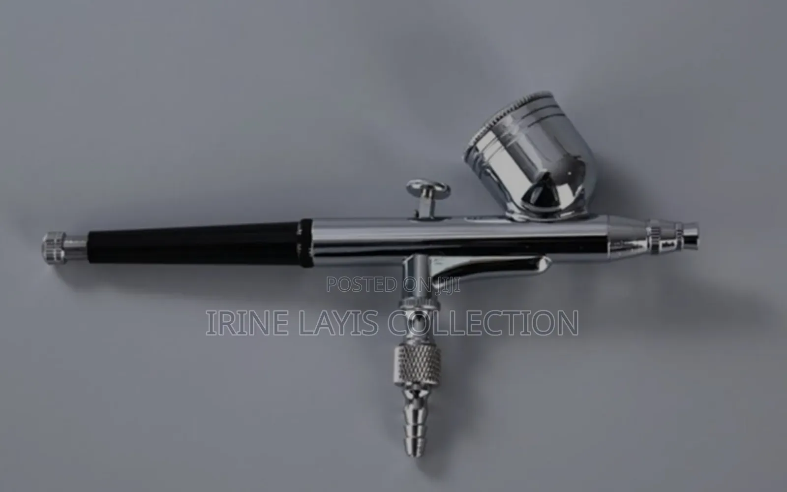 Dual-Action Gravity Feed Airbrush Gun.