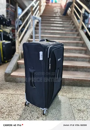 Traveling Cloth Suitcases. Medium Size. Black Color