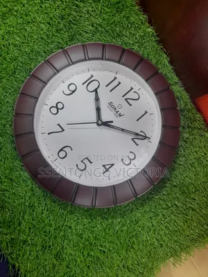 Brown Indian Wall Clock