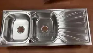 Stainless Steel Double Bowl With a Drainer Tray.