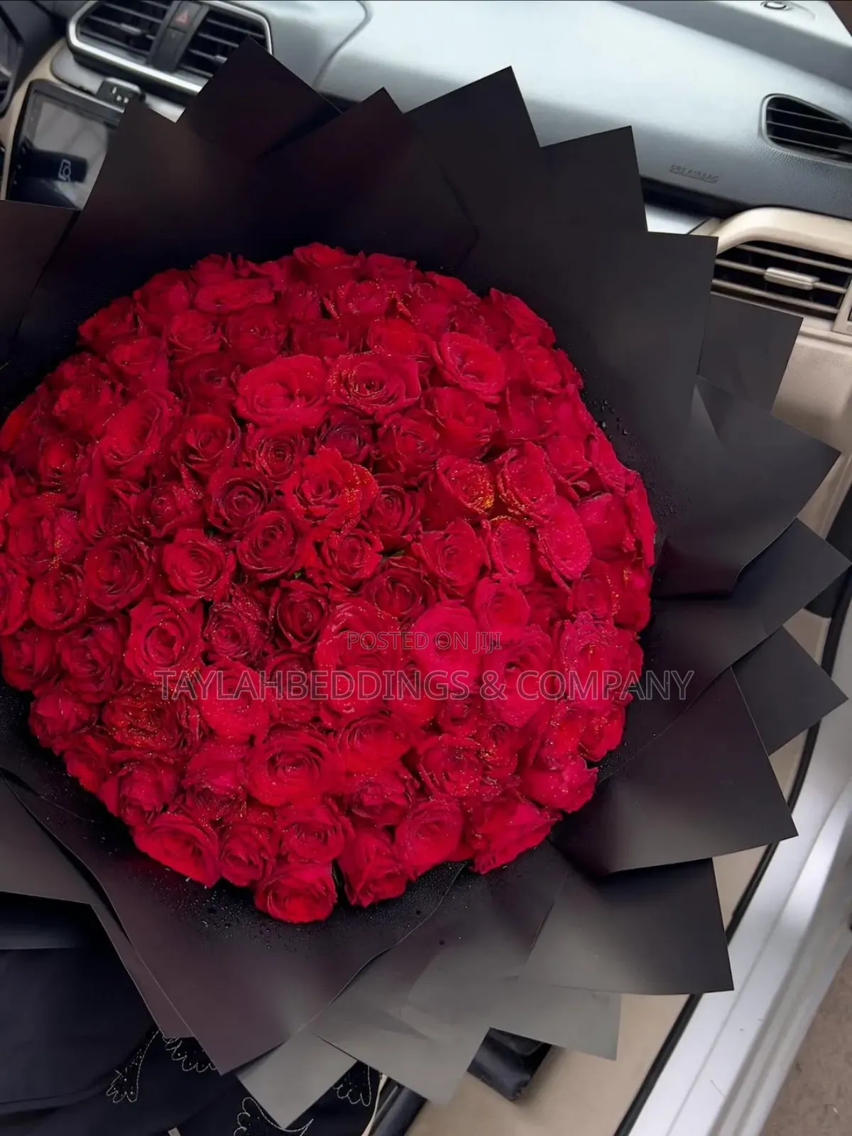 Premium Red Roses in Luxurious Black Wrapping Gift
