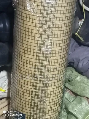 Coated Welded Wire Mesh, Often Referred to as Rabbit or Chicken Mesh.