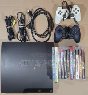 Playstation 3 Console, Cords, 2 Controllers, and 11 Games -