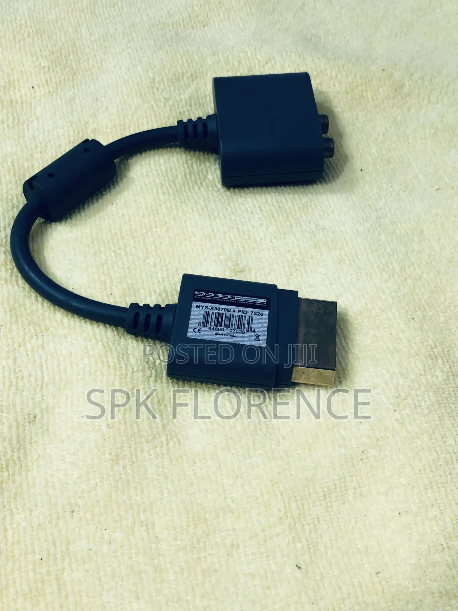 Microsoft Xbox 360 Optical Audio Adapter.