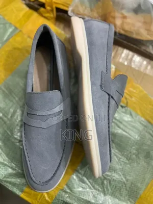 Contrasting White Rubber Sole Penny Loafers.