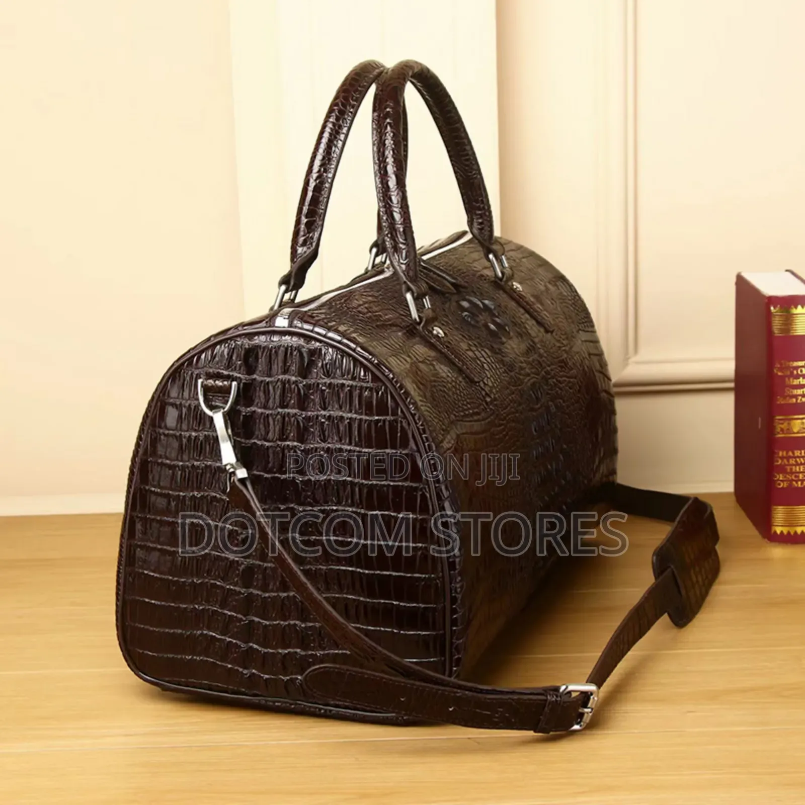 Black Alligator-Embossed (Or Crocodile-Pattern) Duffel Bag.